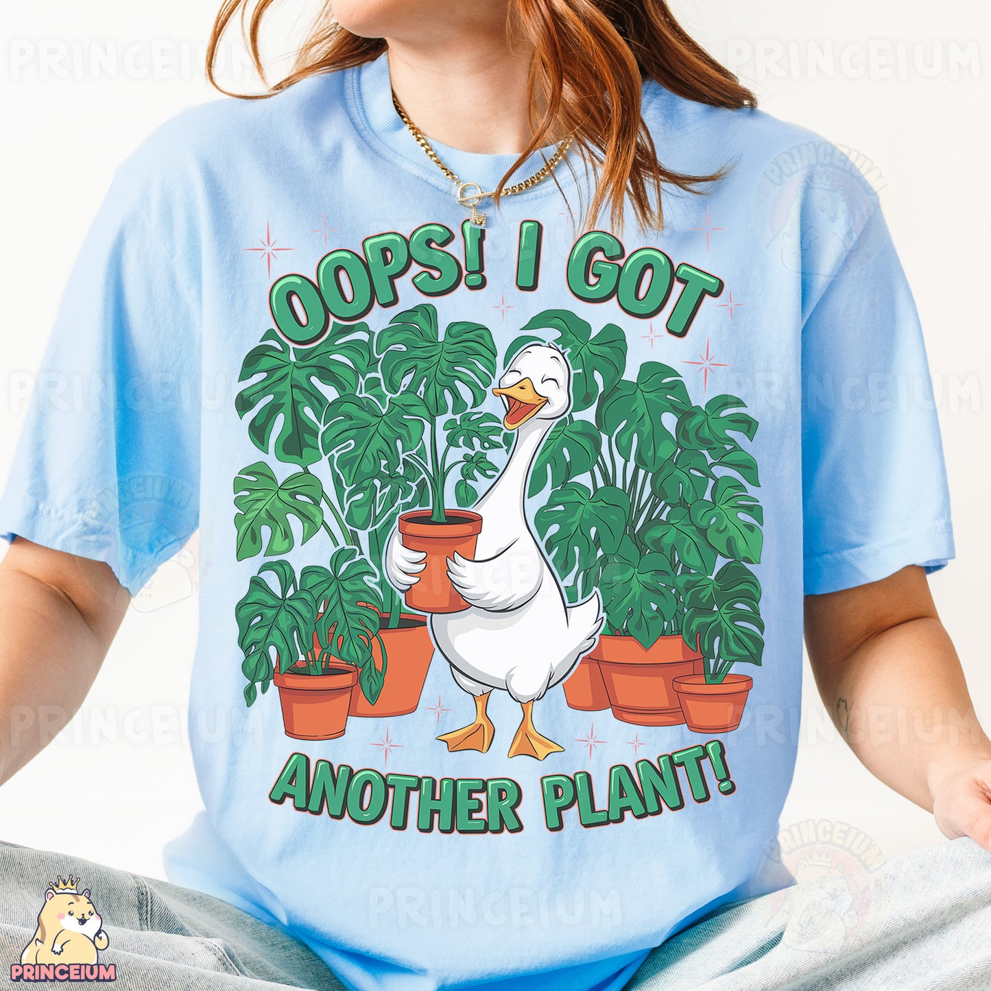 a woman wearing a t - shirt with a goose holding a potted plant