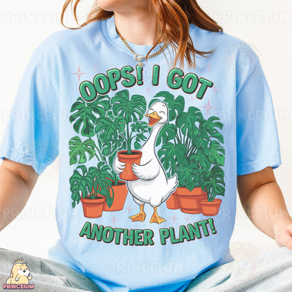 a woman wearing a t - shirt with a goose holding a potted plant
