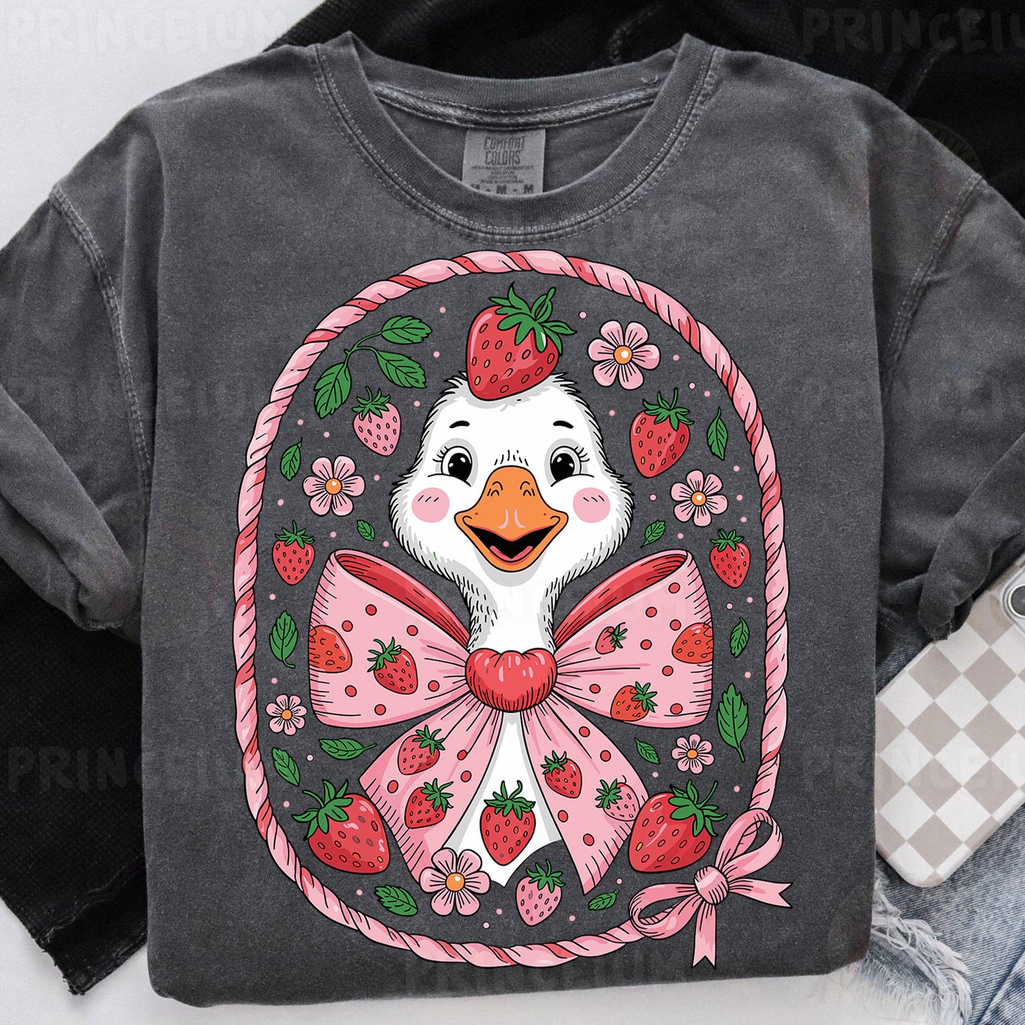 a t - shirt with a duck wearing a bow and strawberries