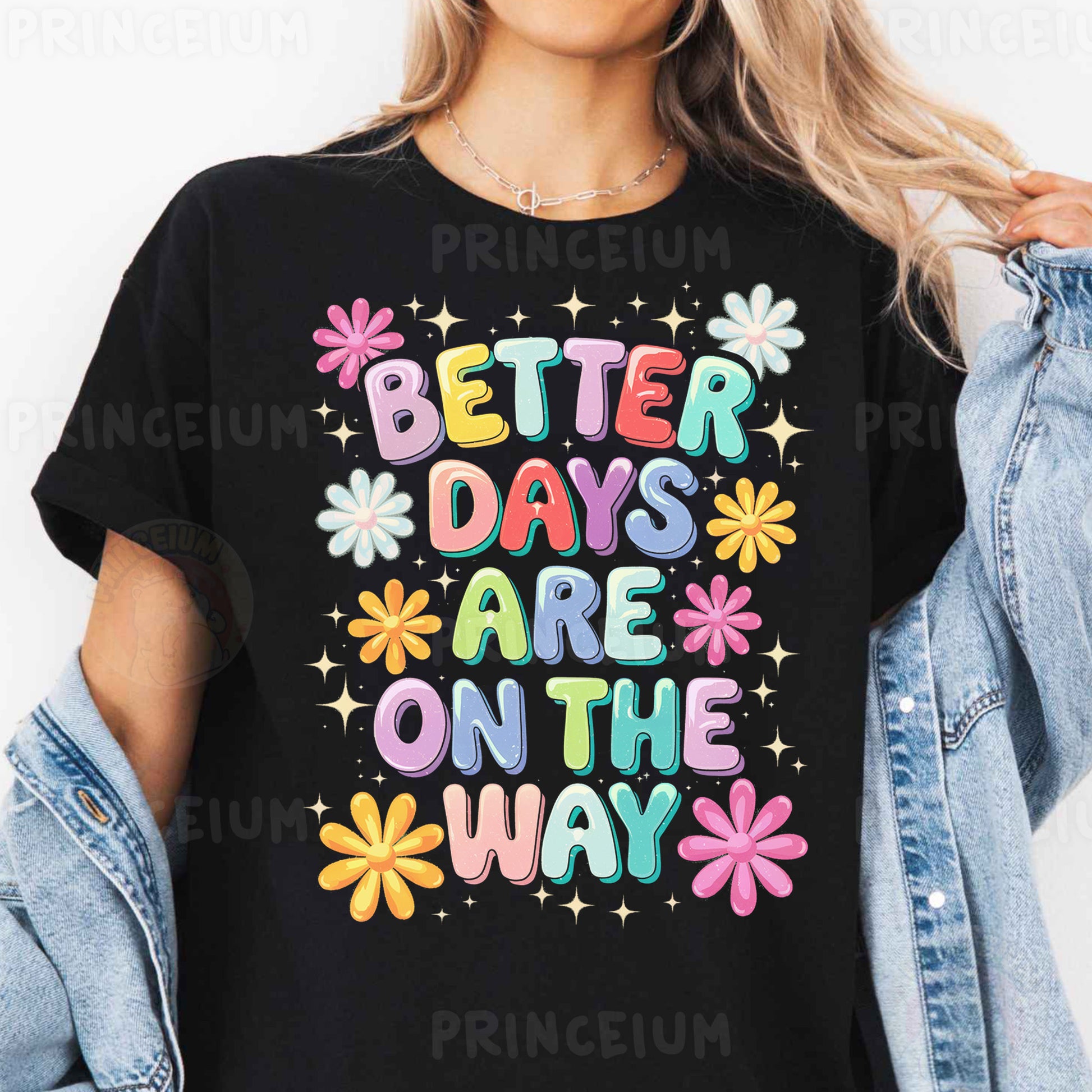 a woman wearing a black t - shirt that says better days are on the way