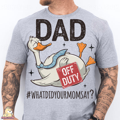 a man wearing a gray shirt with a duck on it