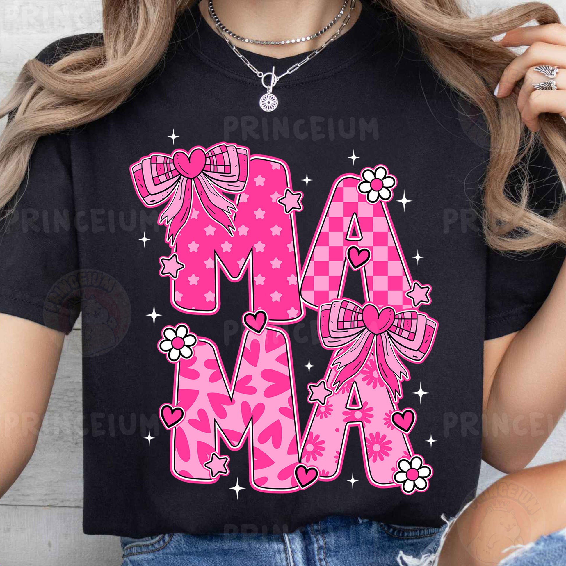 a woman wearing a black shirt with pink letters and bows