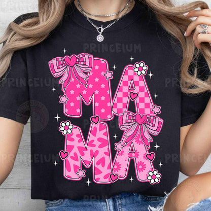 a woman wearing a black shirt with pink letters and bows