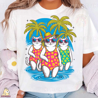 a woman wearing a white t - shirt with two cats on it