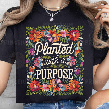 a woman wearing a black shirt that says, planted with a purpose