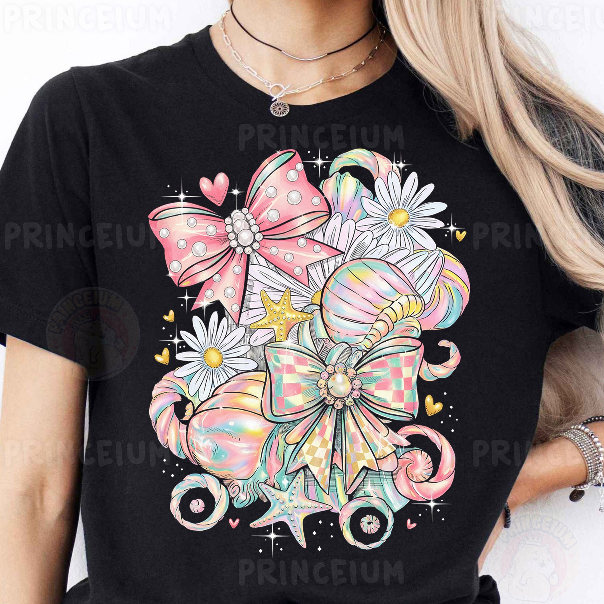 a woman wearing a black shirt with a pink bow and flowers on it