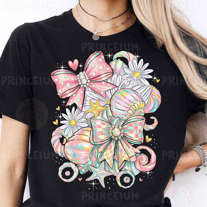 a woman wearing a black shirt with a pink bow and flowers on it