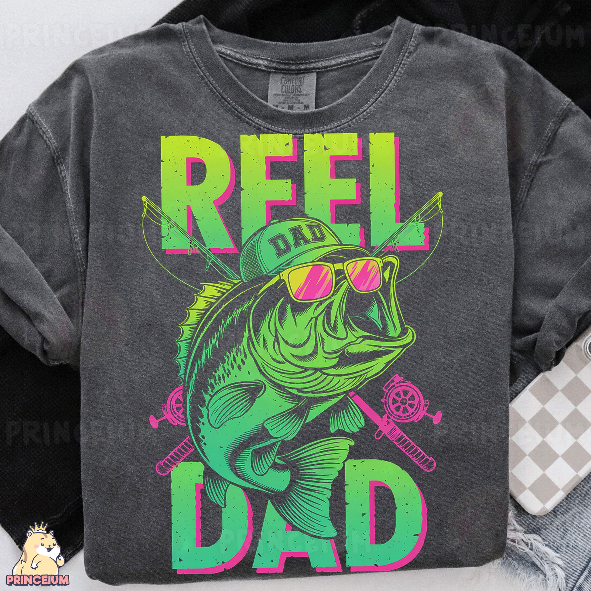 a t - shirt that says reel dad on it