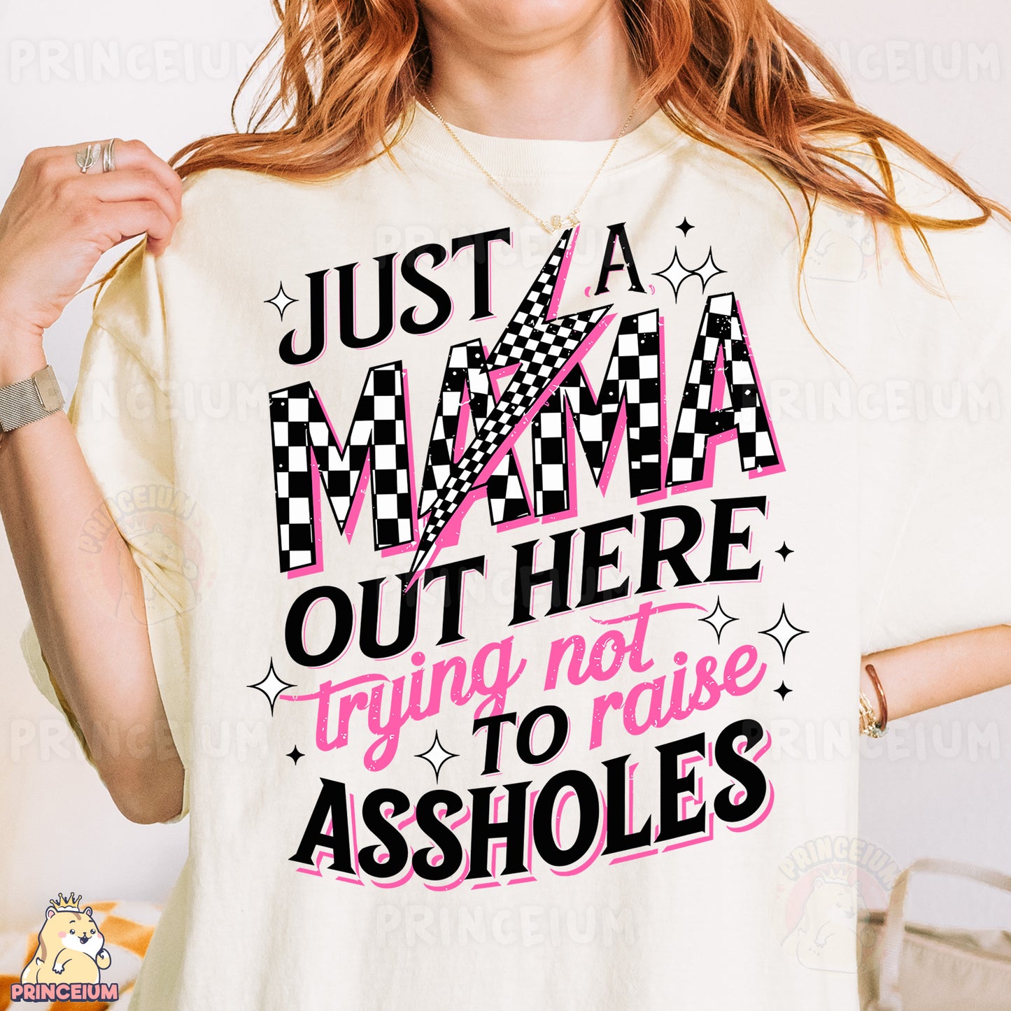 a woman wearing a t - shirt that says just a mama out here trying not