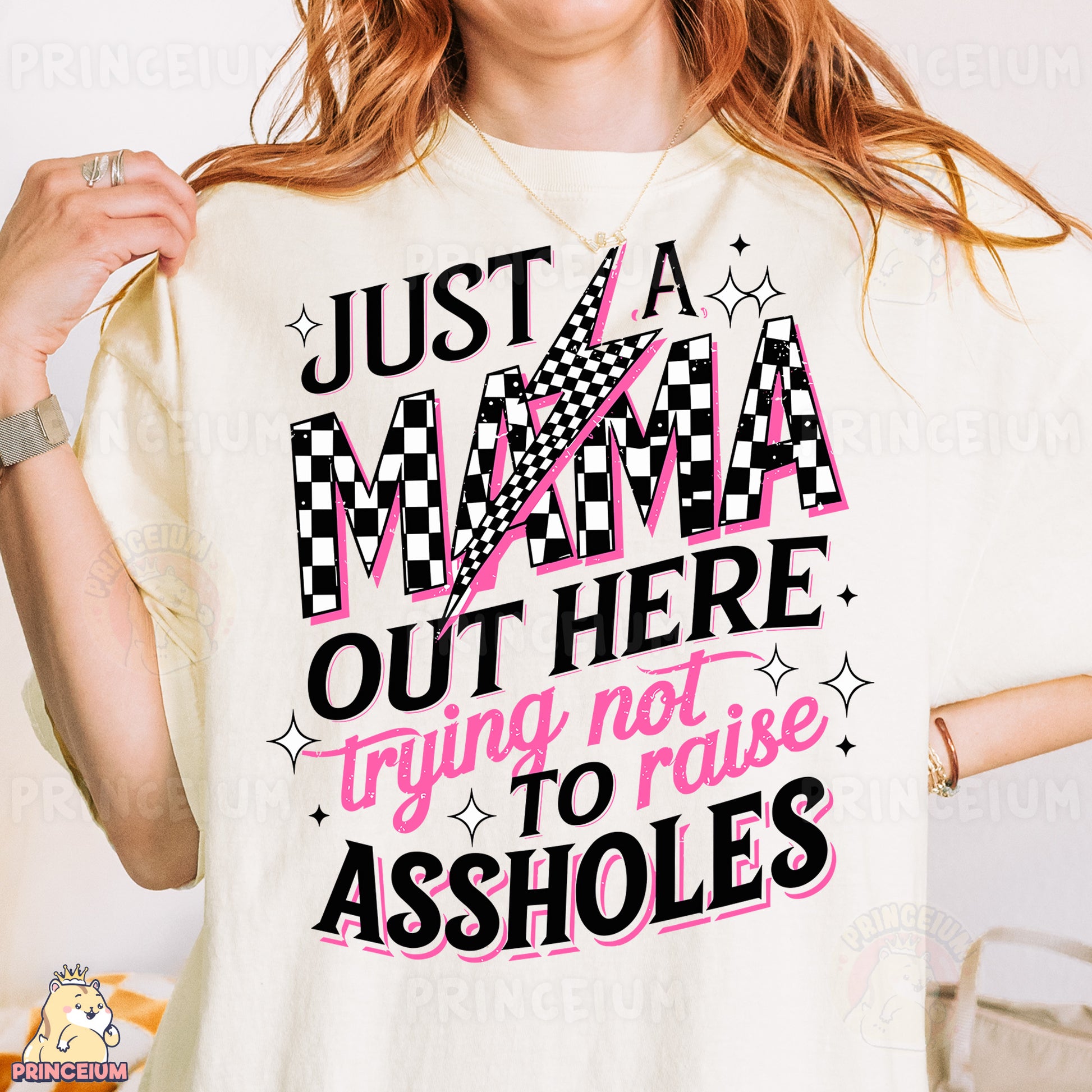a woman wearing a t - shirt that says just a mama out here trying not