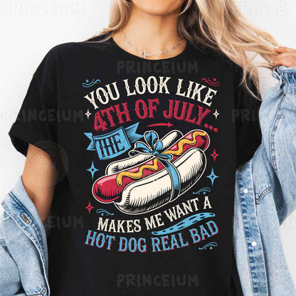 a woman wearing a black shirt with a hot dog on it