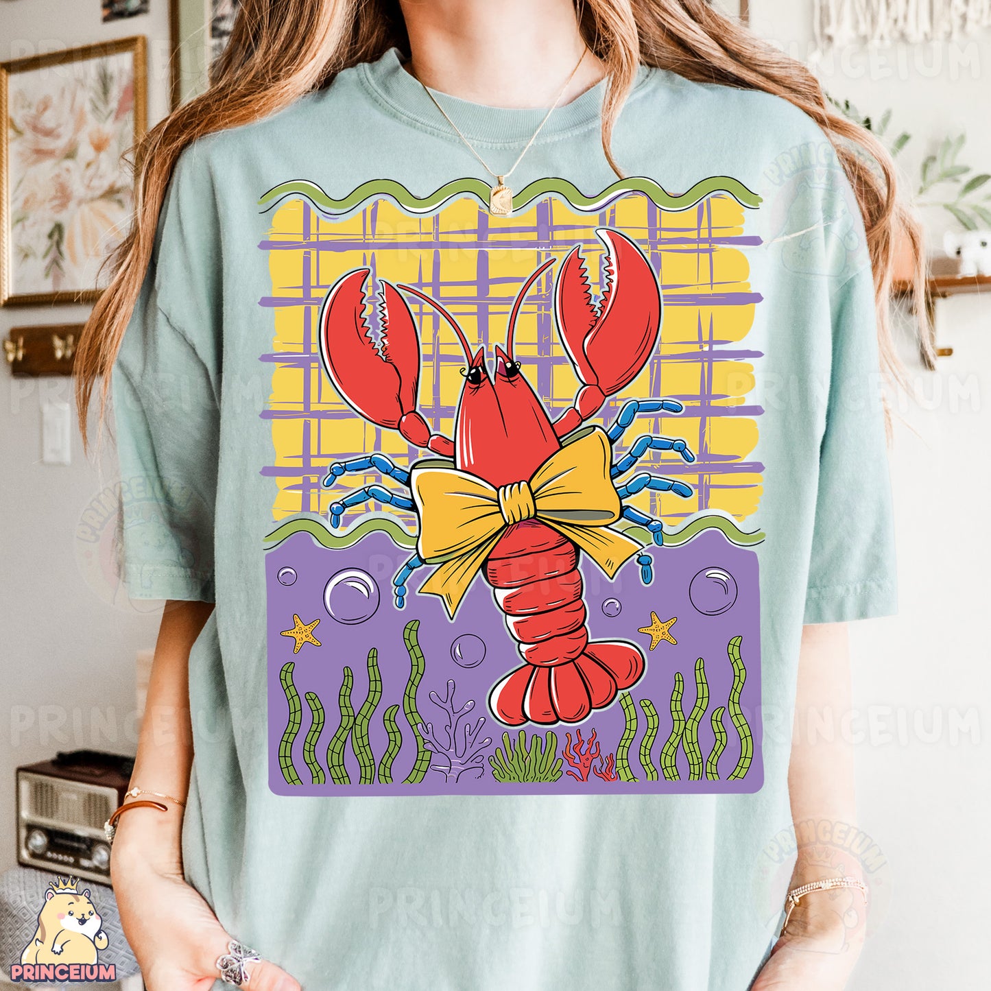 a woman wearing a t - shirt with a lobster on it