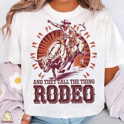 a woman wearing a t - shirt that says rodeo and they call the thing rodeo