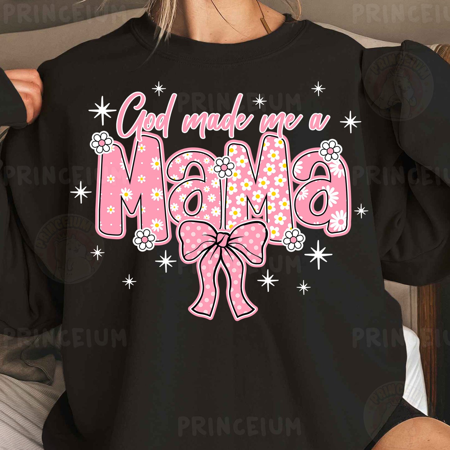 a woman wearing a black shirt with a pink bow