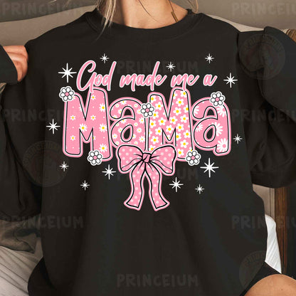 a woman wearing a black shirt with a pink bow