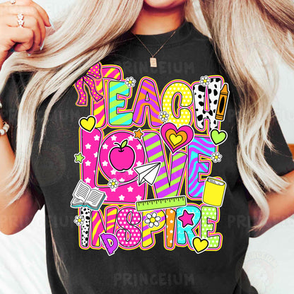 a woman wearing a t - shirt that says teach love inspire