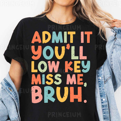 a woman wearing a t - shirt that says admit it you'll low key