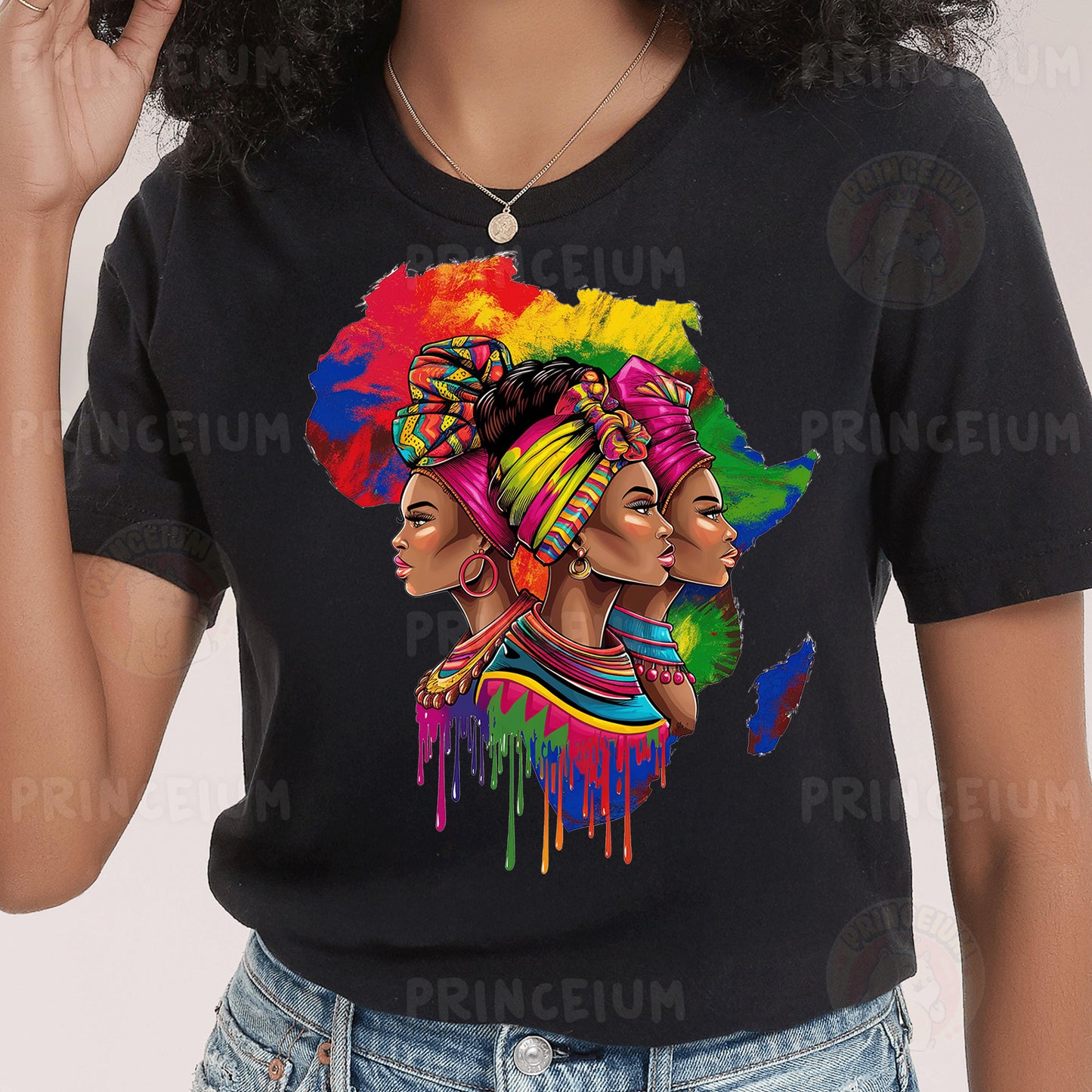 a woman wearing a black t - shirt with a picture of two african women on