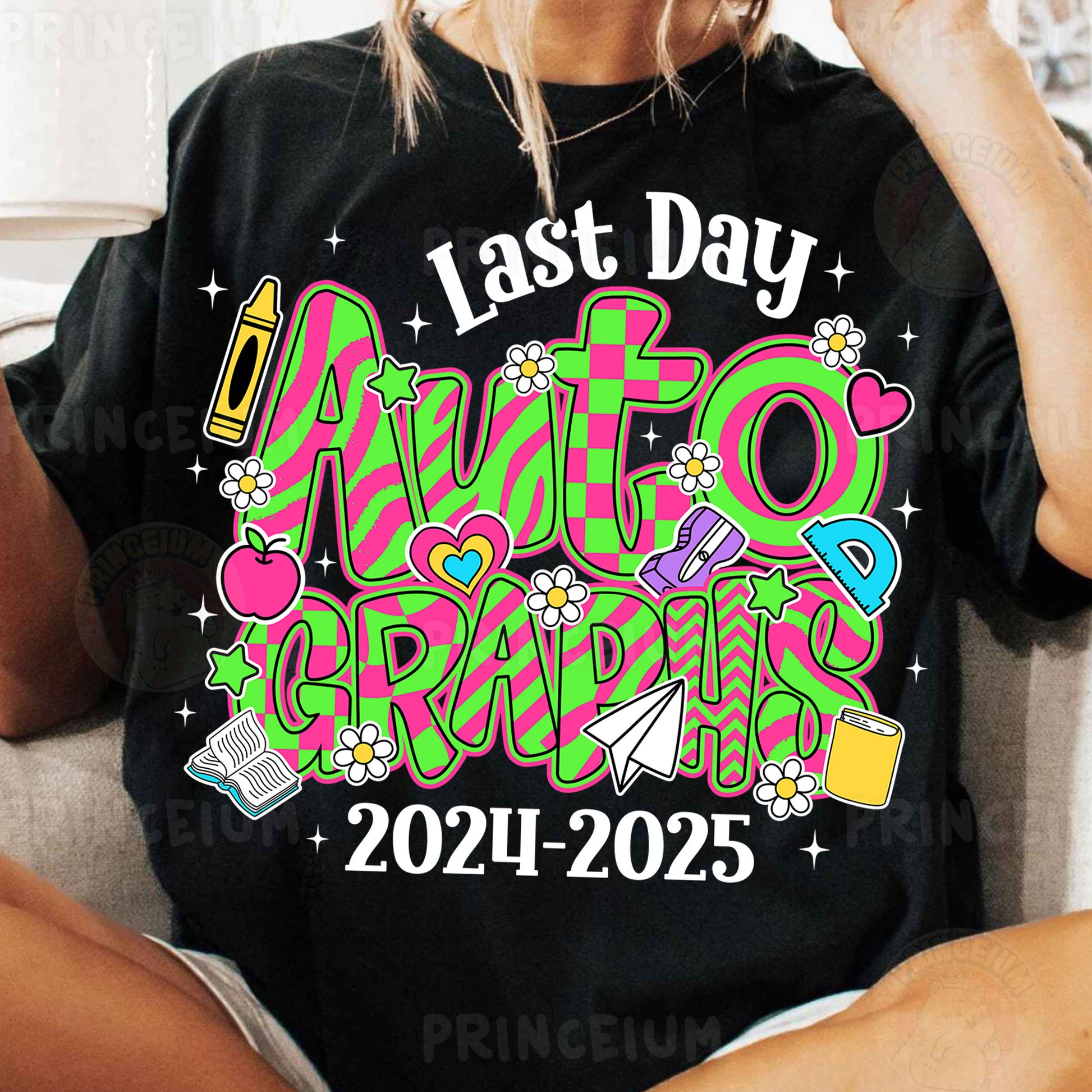 a woman sitting on a couch wearing a t - shirt that says last day auto