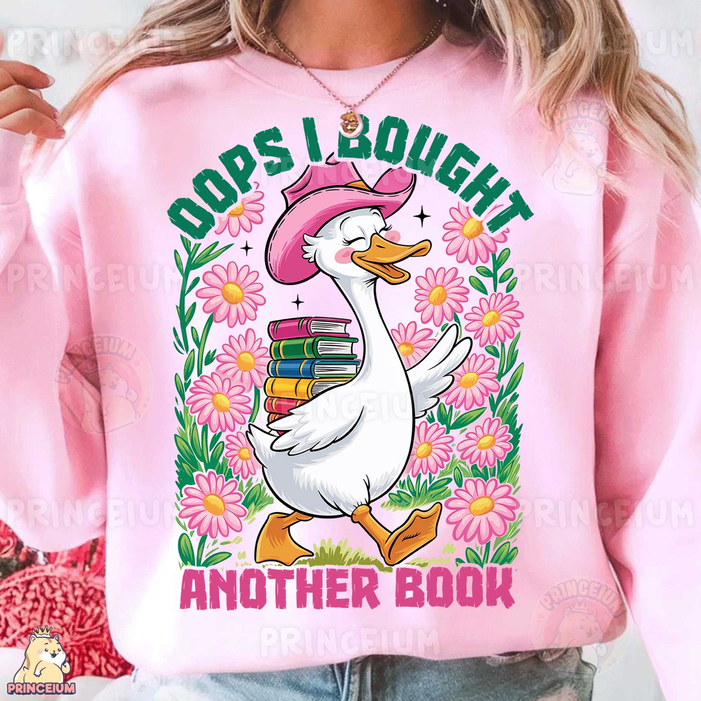 a woman wearing a pink sweatshirt with a duck wearing a pink hat