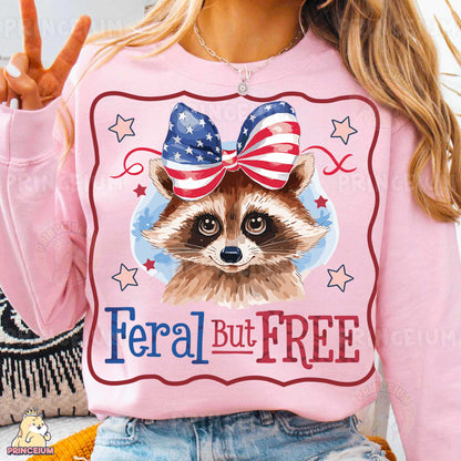 a woman wearing a pink shirt with a raccoon on it