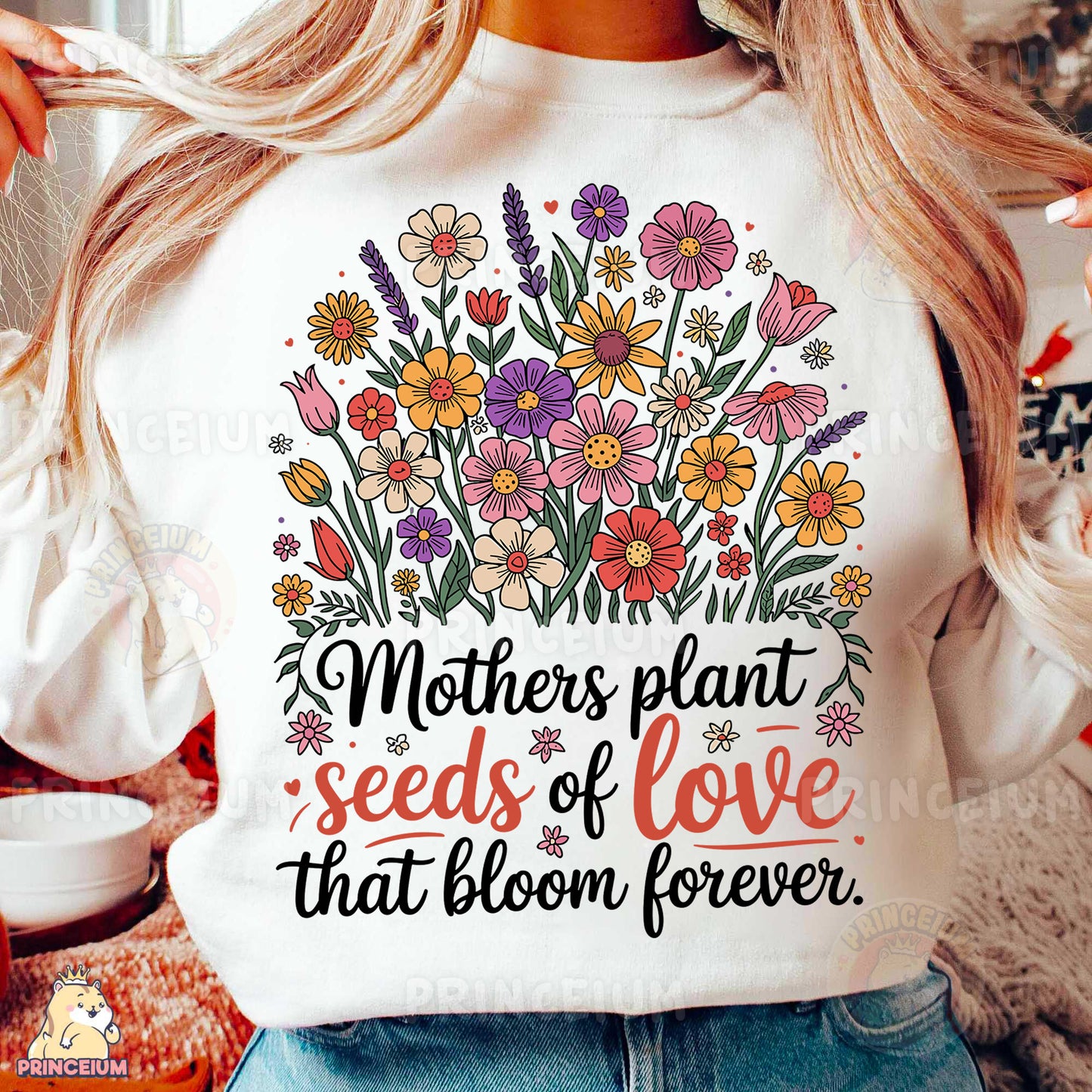 a woman wearing a t - shirt that says mothers plant seeds of love that bloom