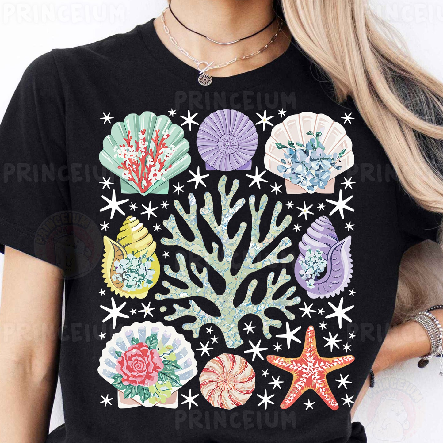 a woman wearing a black shirt with colorful seashells on it