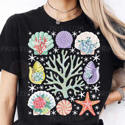 a woman wearing a black shirt with colorful seashells on it