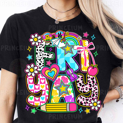 a woman wearing a black t - shirt with the letter k on it