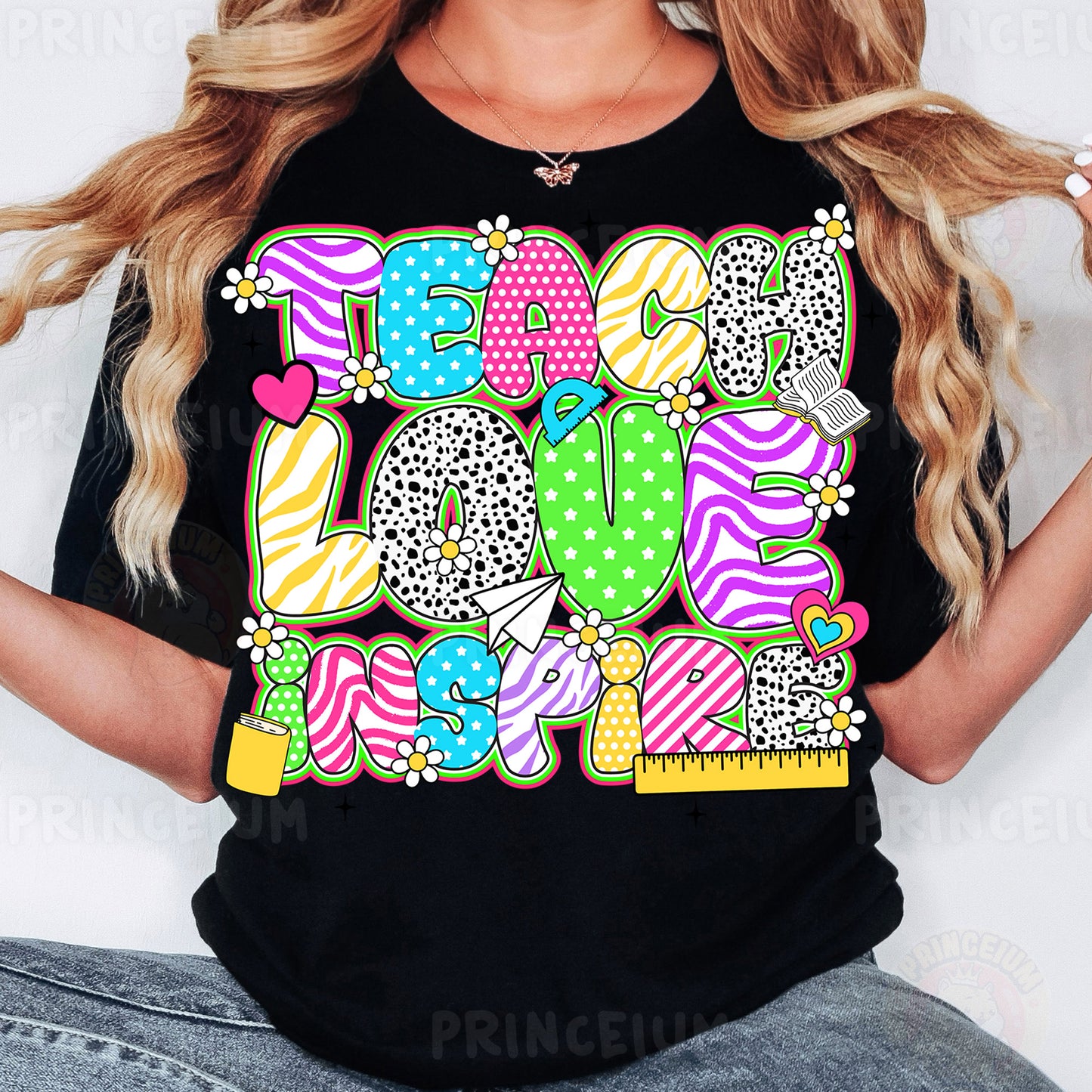 a woman wearing a black t - shirt with the word love on it