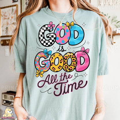 a woman wearing a t - shirt that says god is good all the time