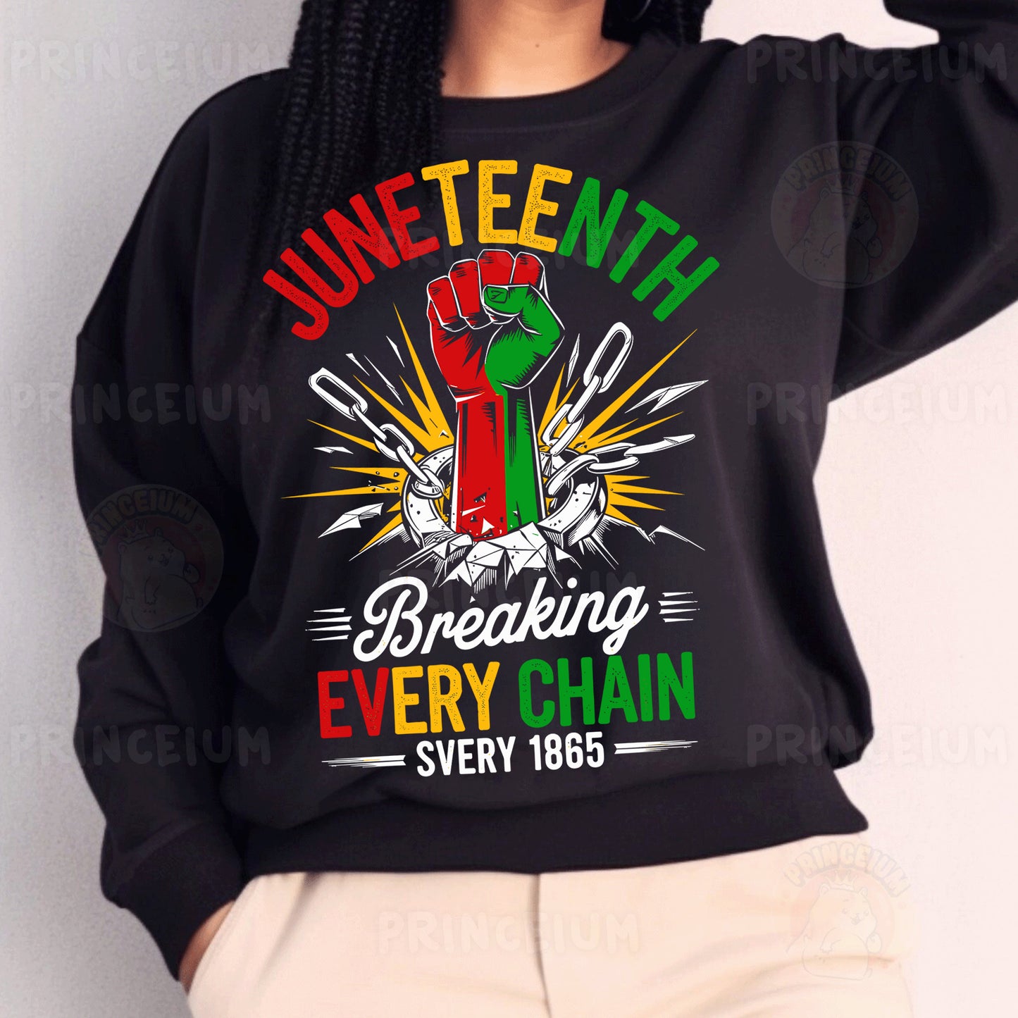 a woman wearing a black sweatshirt with a fist on it