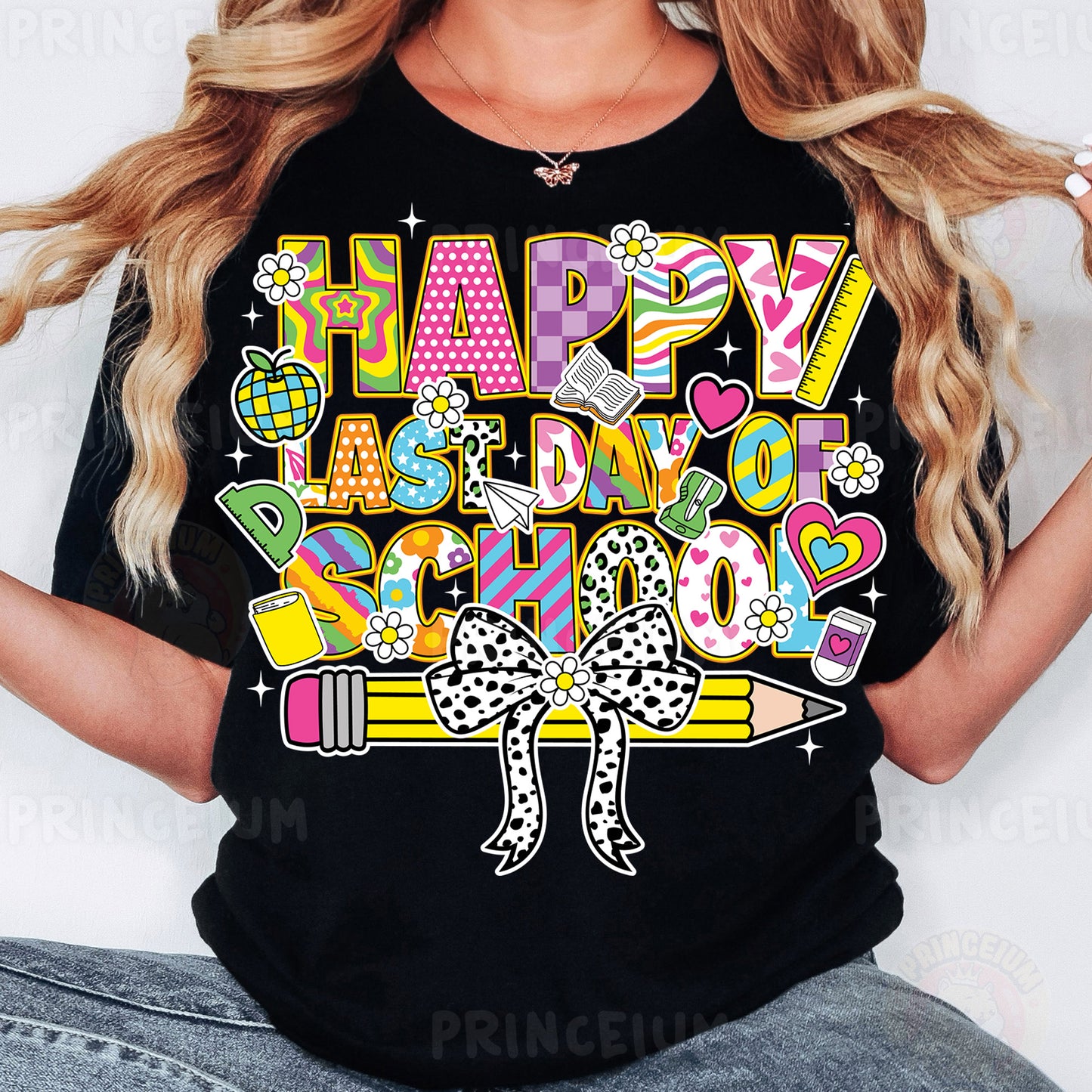 a woman wearing a black happy birthday tshirt