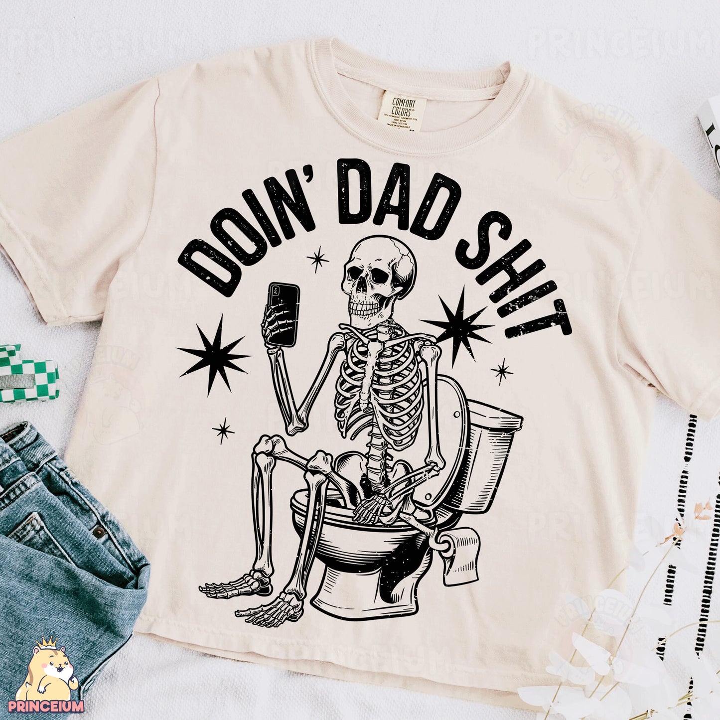 a t - shirt with a skeleton sitting on a toilet