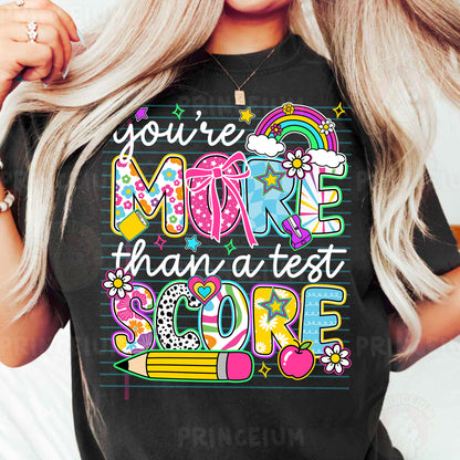 a woman wearing a t - shirt that says you're more than a test