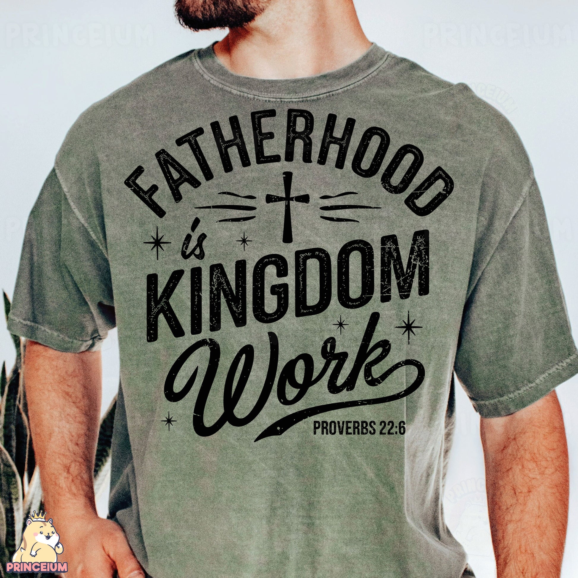a man wearing a t - shirt that says fatherhood is kingdom work