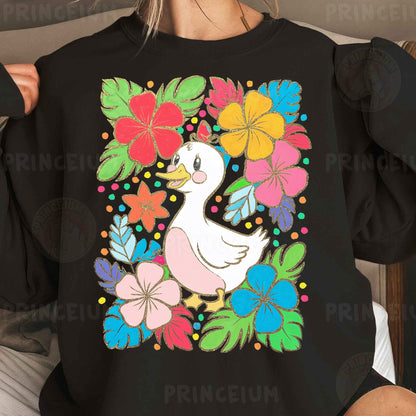 a woman wearing a black sweatshirt with a white duck surrounded by flowers