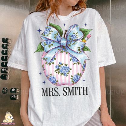 a woman wearing a t - shirt with a bow on it