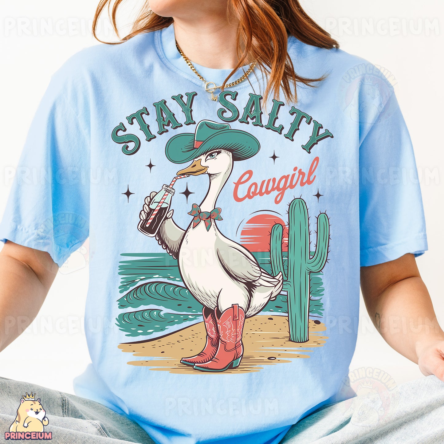 a woman wearing a blue shirt with a duck wearing a sombrero