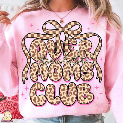 a woman wearing a pink sweatshirt with a leopard print