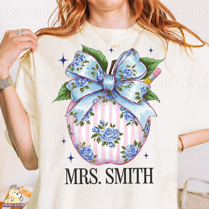 a woman wearing a t - shirt with a bow on it