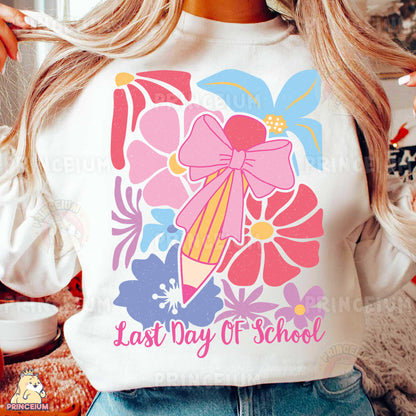 a close up of a person wearing a shirt with a pencil on it