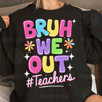a woman wearing a black sweatshirt that says bruh we out teachers
