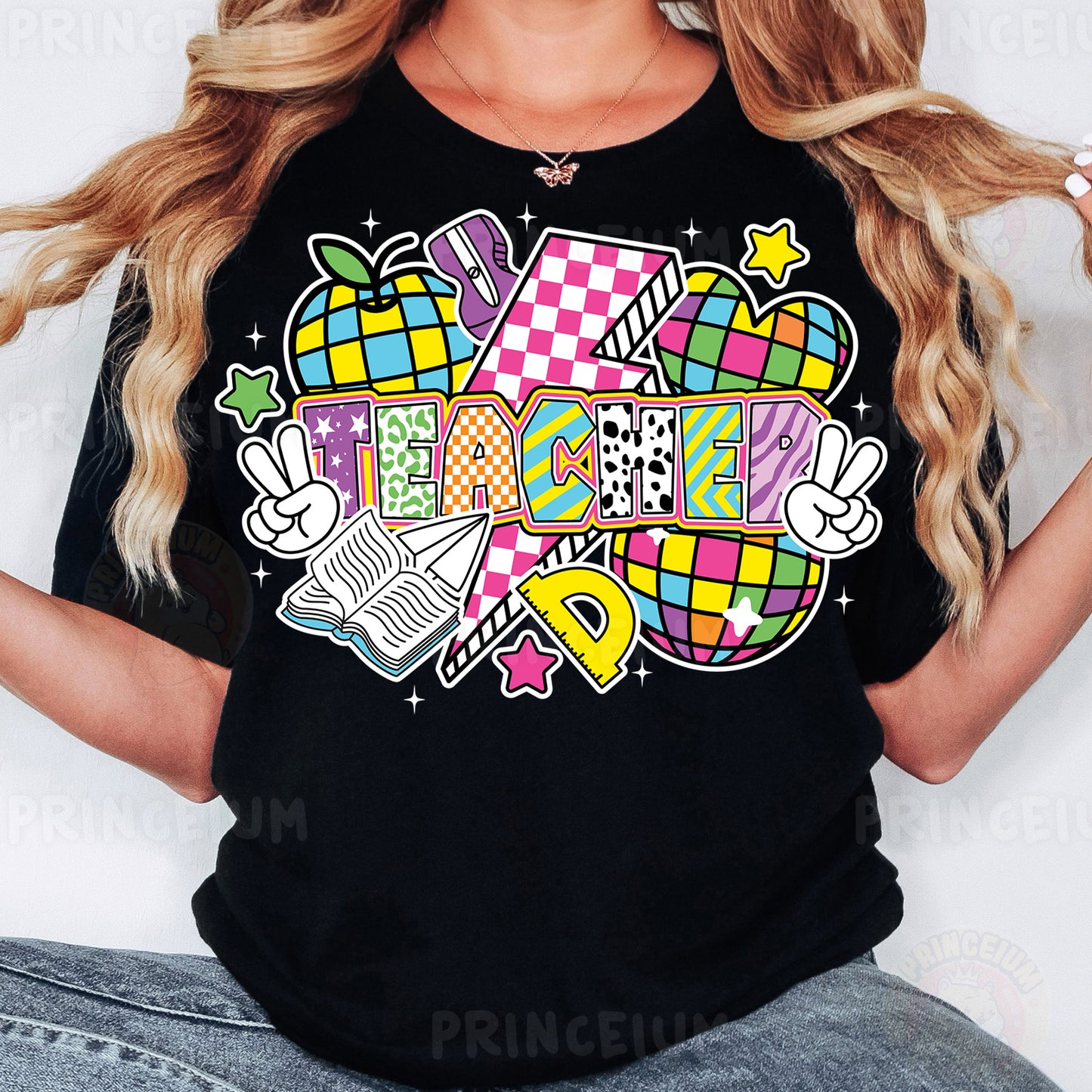 a woman wearing a black t - shirt with a colorful graphic design