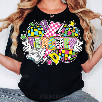 a woman wearing a black t - shirt with a colorful graphic design