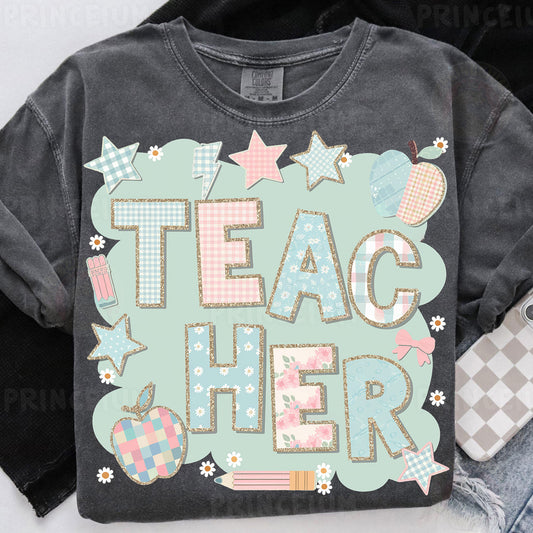 a t - shirt with the words teac her on it