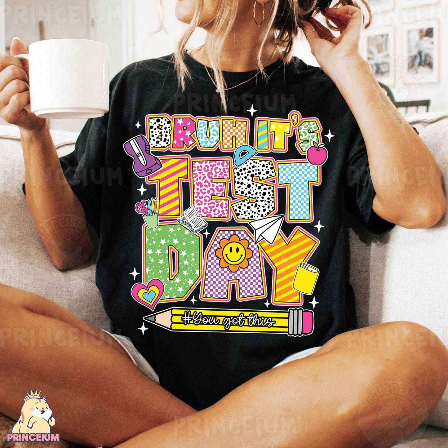 a woman sitting on a couch holding a cup of coffee