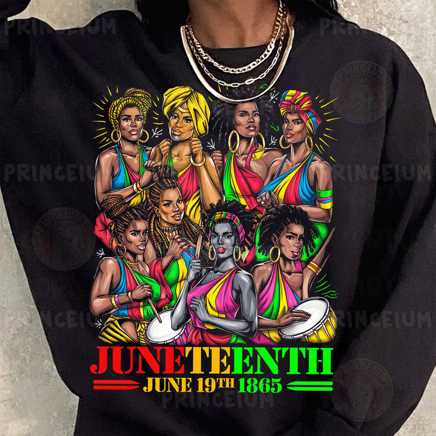 a woman wearing a black shirt with a bunch of women on it