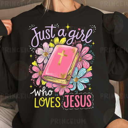 a woman wearing a black shirt that says just a girl who loves jesus