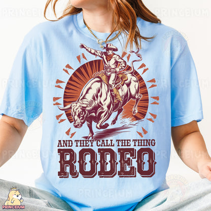 a woman wearing a t - shirt that says rodeo and they call the thing rodeo
